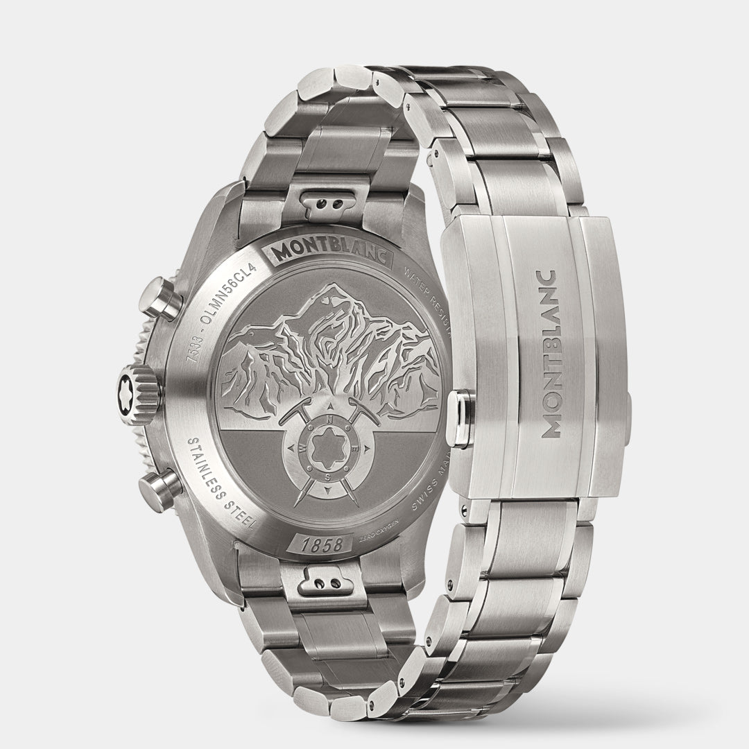 Silver Montblanc watch with detailed back design on a light gray background