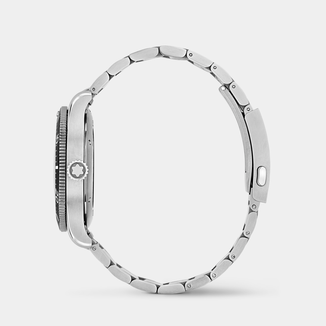 Close-up of a silver watch case on a white background