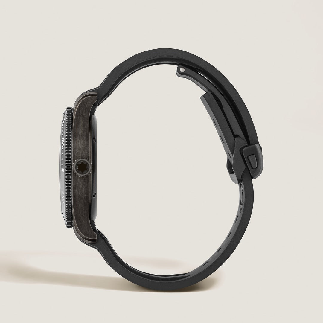 Black watch case on a beige background