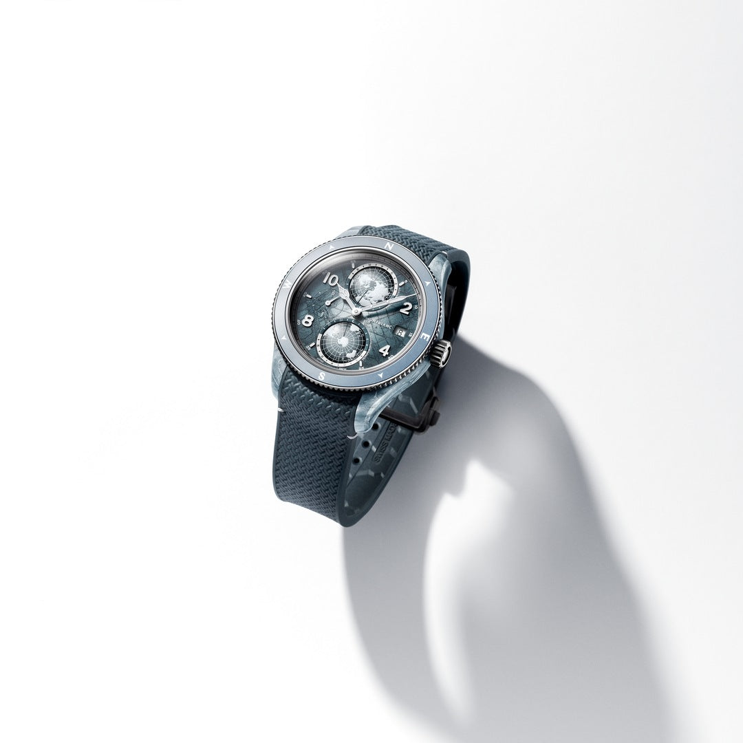 Luxury watch with a detailed face and textured strap on a white background