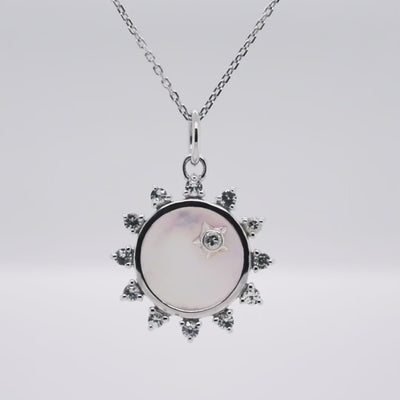 Sterling silver white mother of pearl and white sapphire sun pendant 360 view