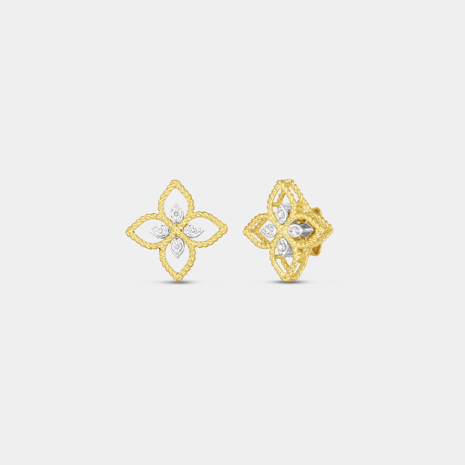 Yellow gold diamond flower stud earrings on gray background.