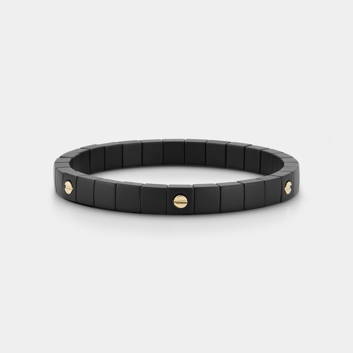 Roberto Demeglio Scacco Vite matte black ceramic bracelet with six 18K yellow gold screws on a white background, front angle view.