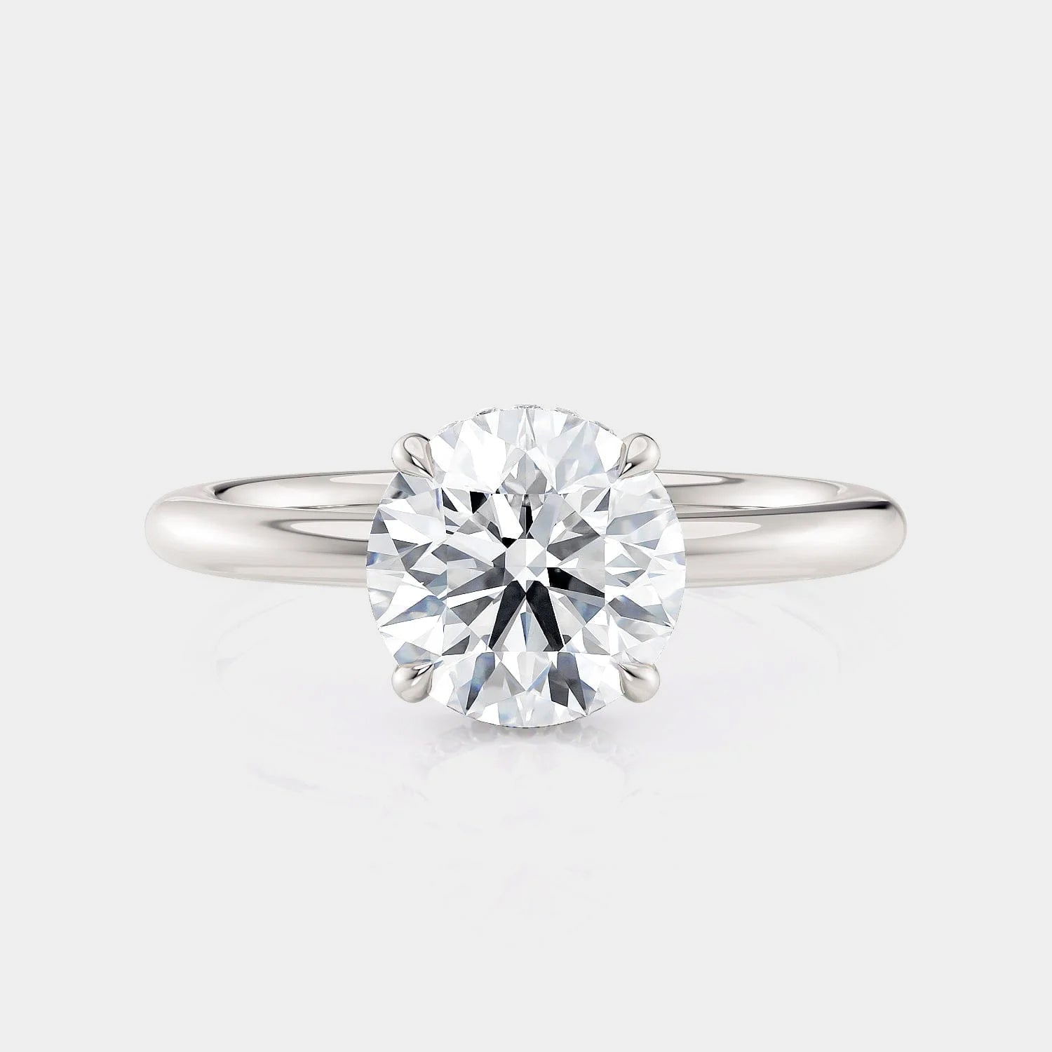 Round Solitaire 18k White Gold Engagement Ring - R750
