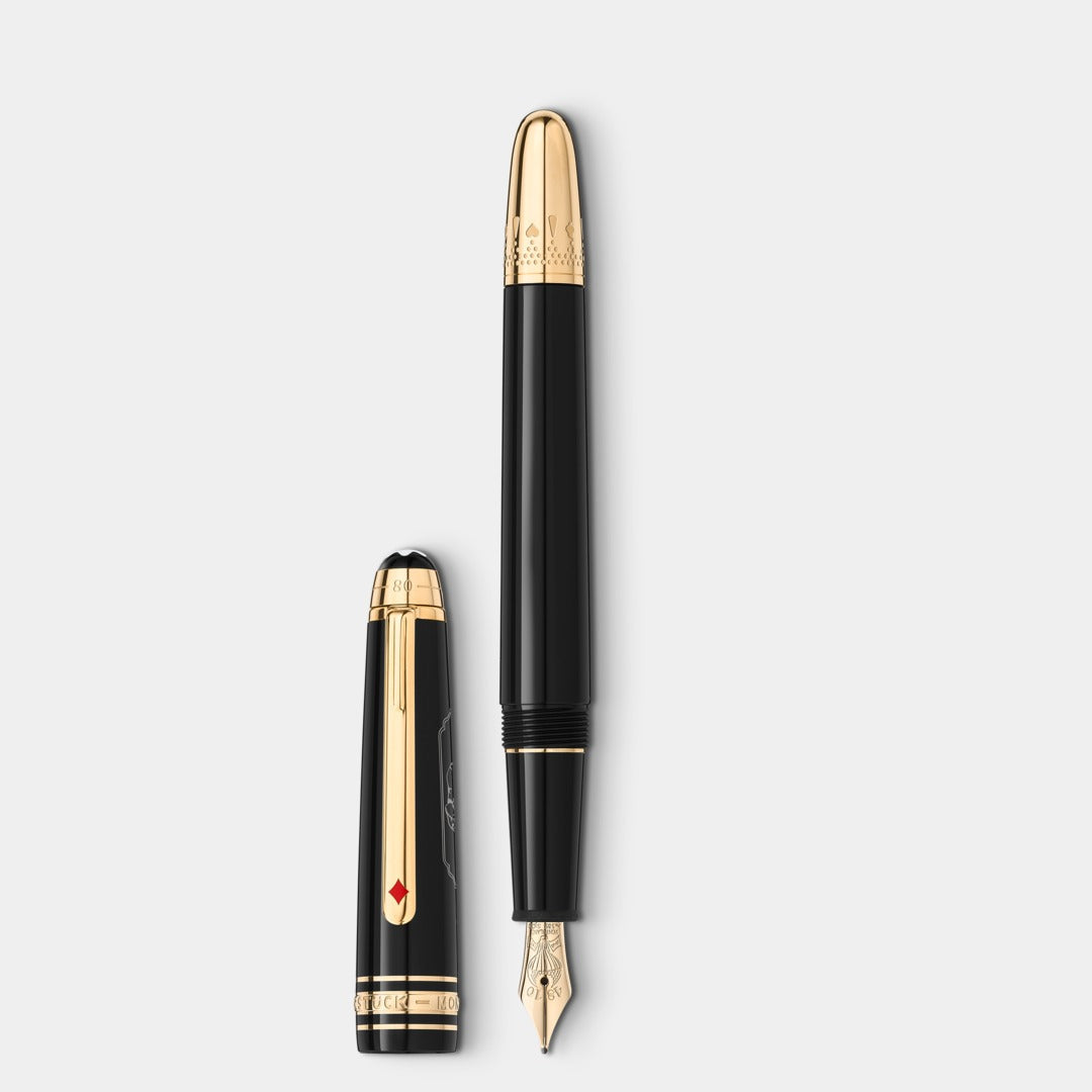 Two black fountain pens with gold accents on a white background