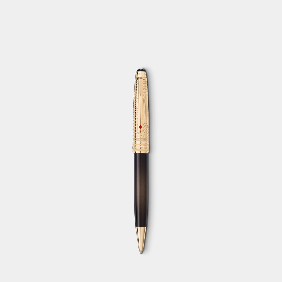 Pen with gold accents on a white background