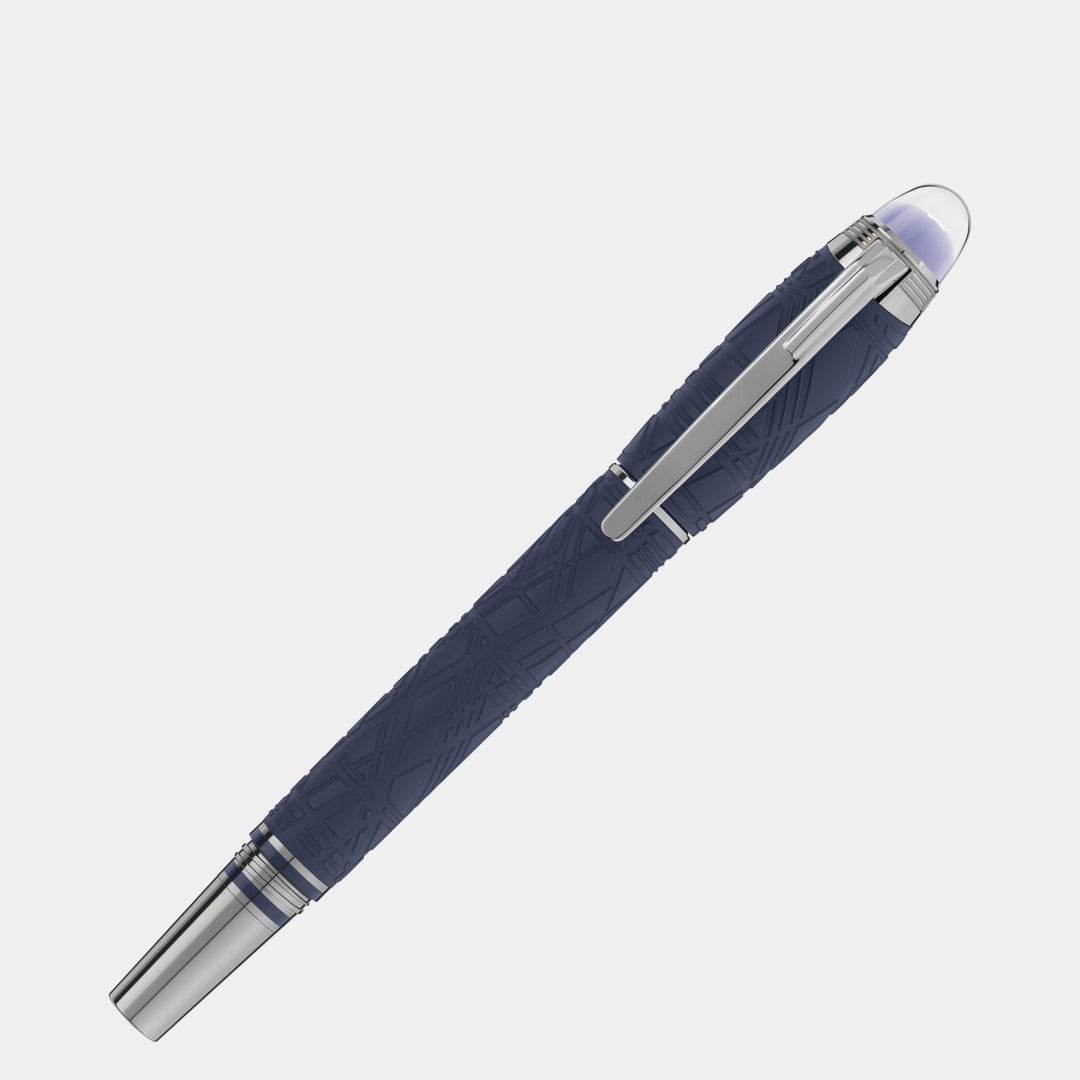 Blue pen with silver accents on a light gray background