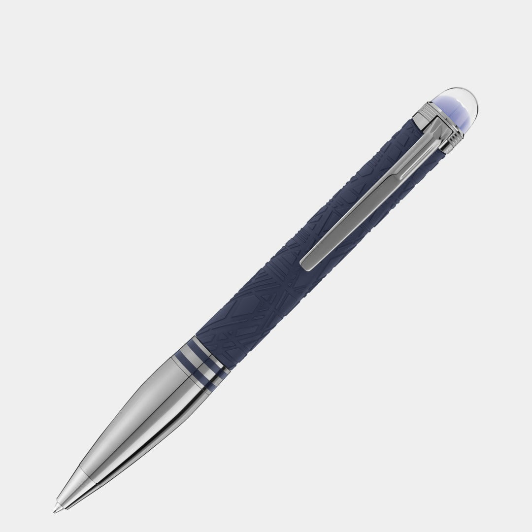 Pen with blue grip and silver accents on a light gray background