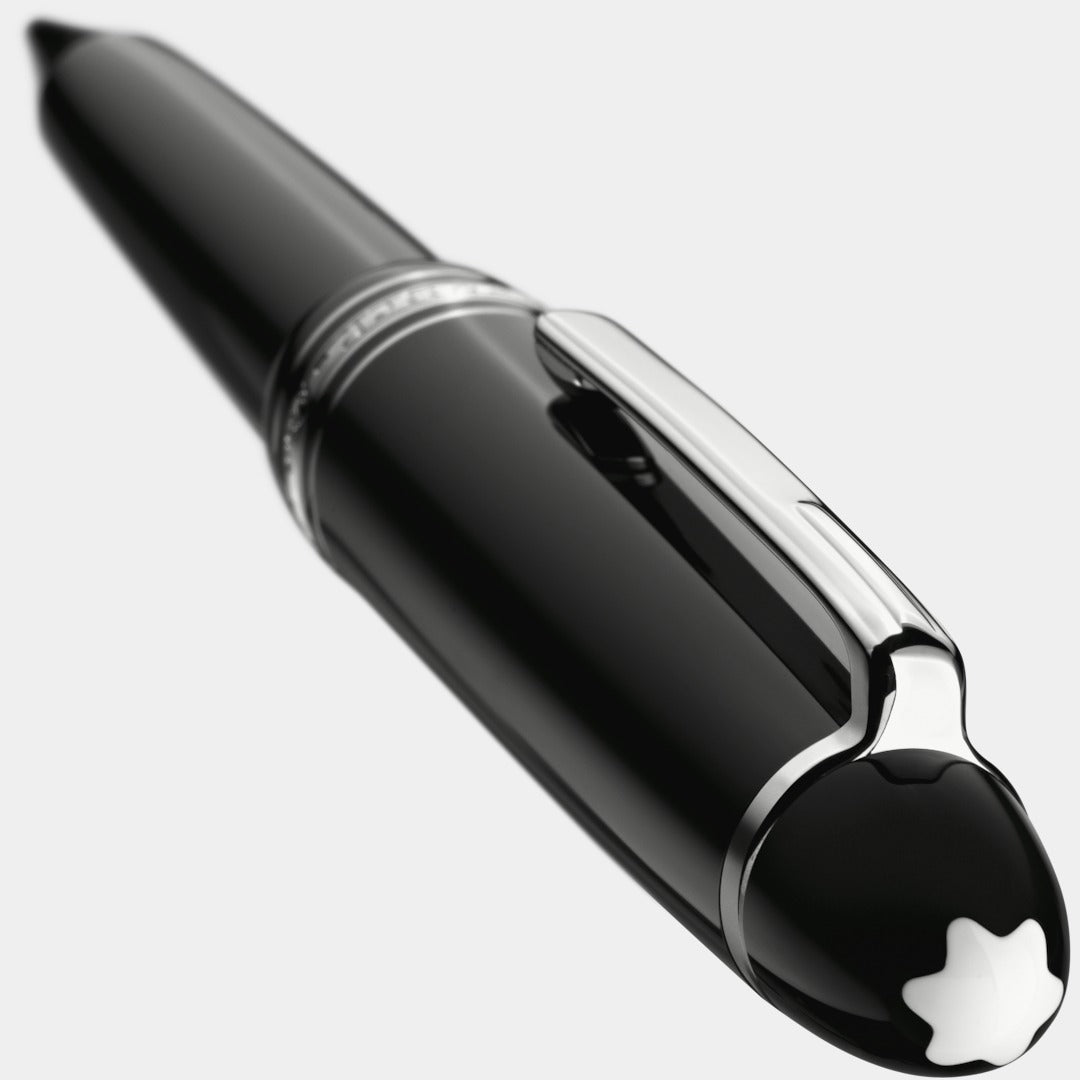 Black and silver montblanc pen on a white background closeup emblem