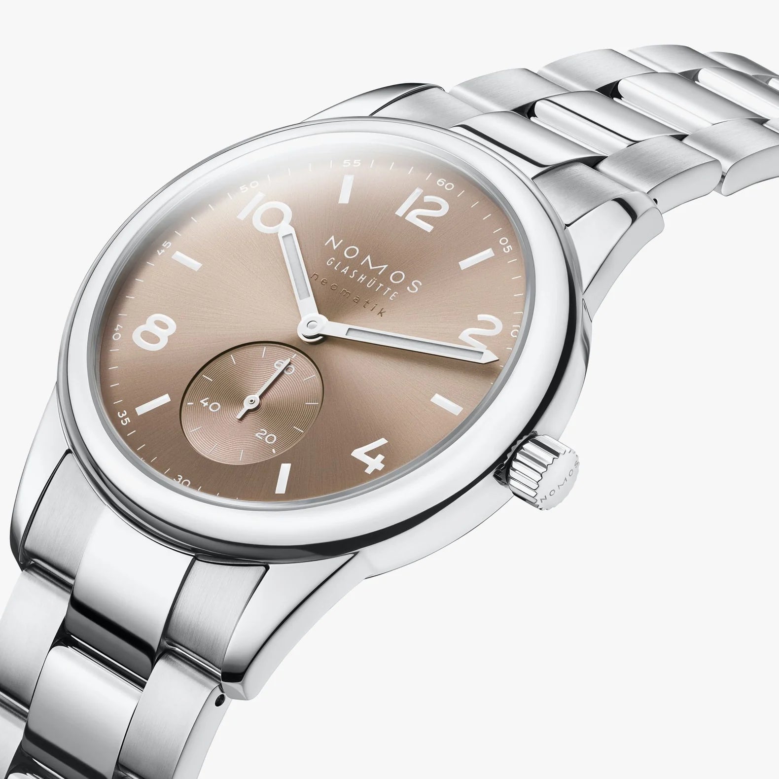 NOMOS Glashütte Club Sport Neomatik 39mm watch with ember beige-gold sunburst dial, luminous hands, and stainless steel bracelet on white background, side angle view