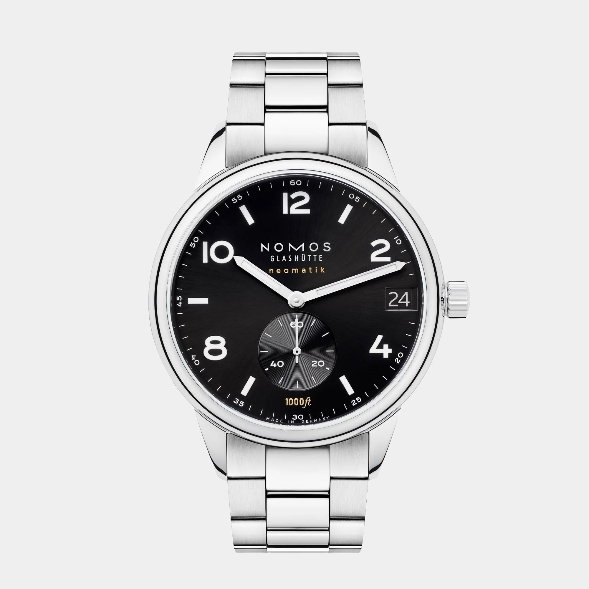 NOMOS Glashütte Club Sport Neomatik 42mm watch with black dial, luminous hands, and stainless steel bracelet on grey background