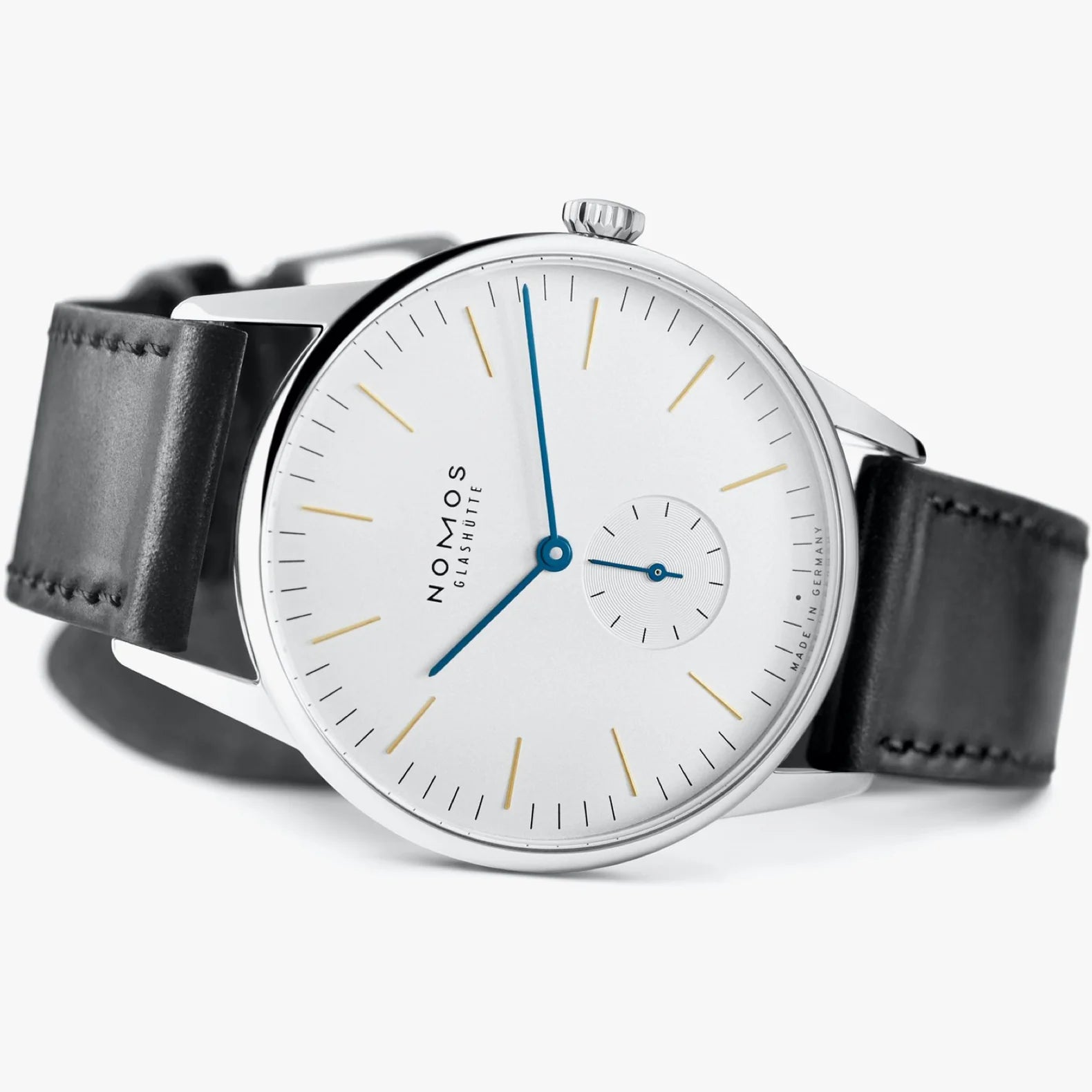 NOMOS Glashütte Orion 38mm watch with white silver-plated dial, tempered blue hands, and black Horween leather strap on white background, laying on side.