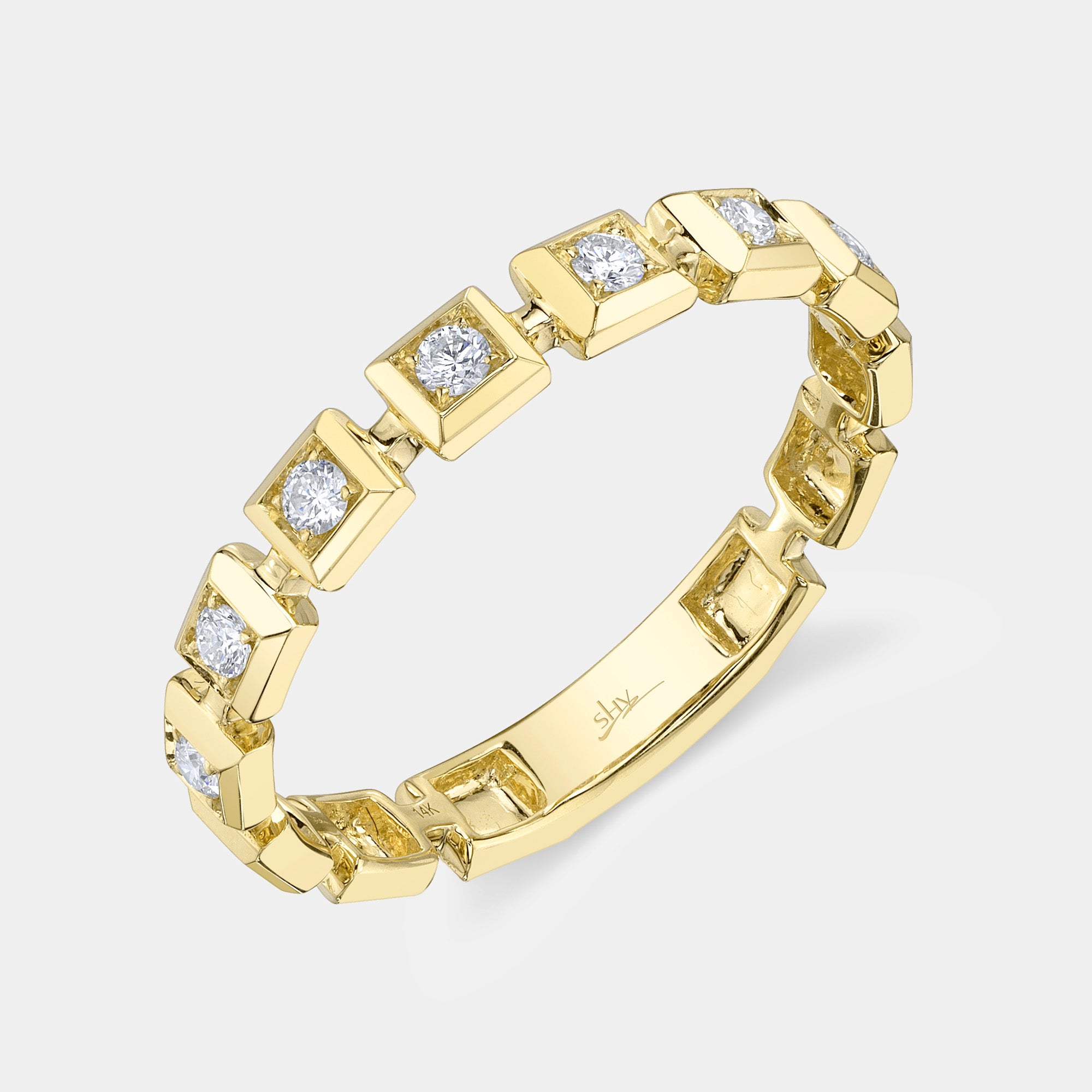 Yellow gold diamond fashion ring with square bezel setting, side angle view