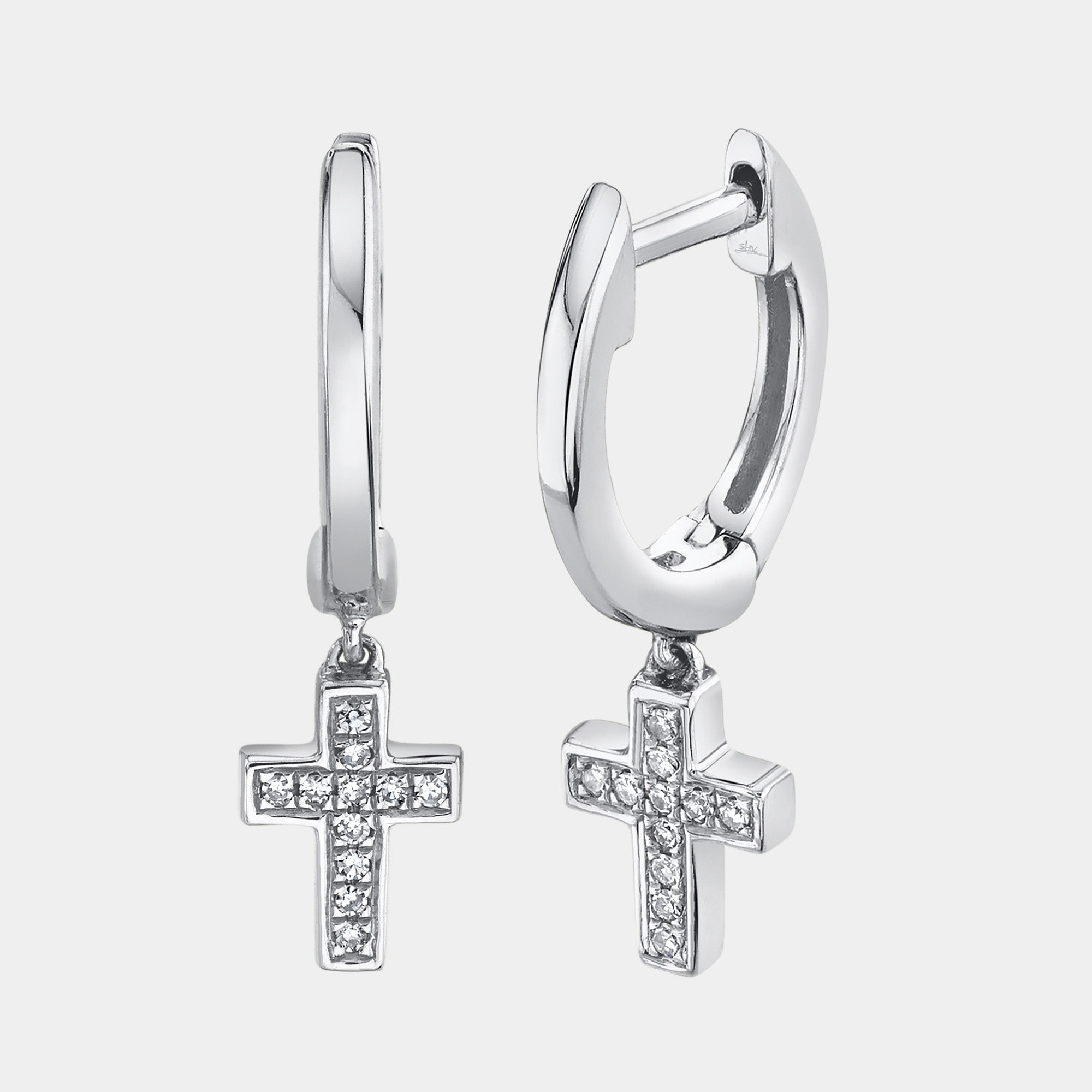 White gold diamond cross huggie earrings, front view