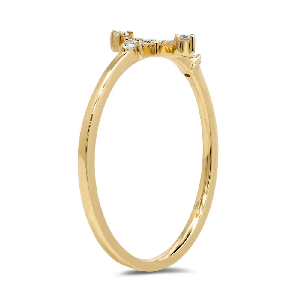 Yellow gold east-west diamond cross ring, side angle view