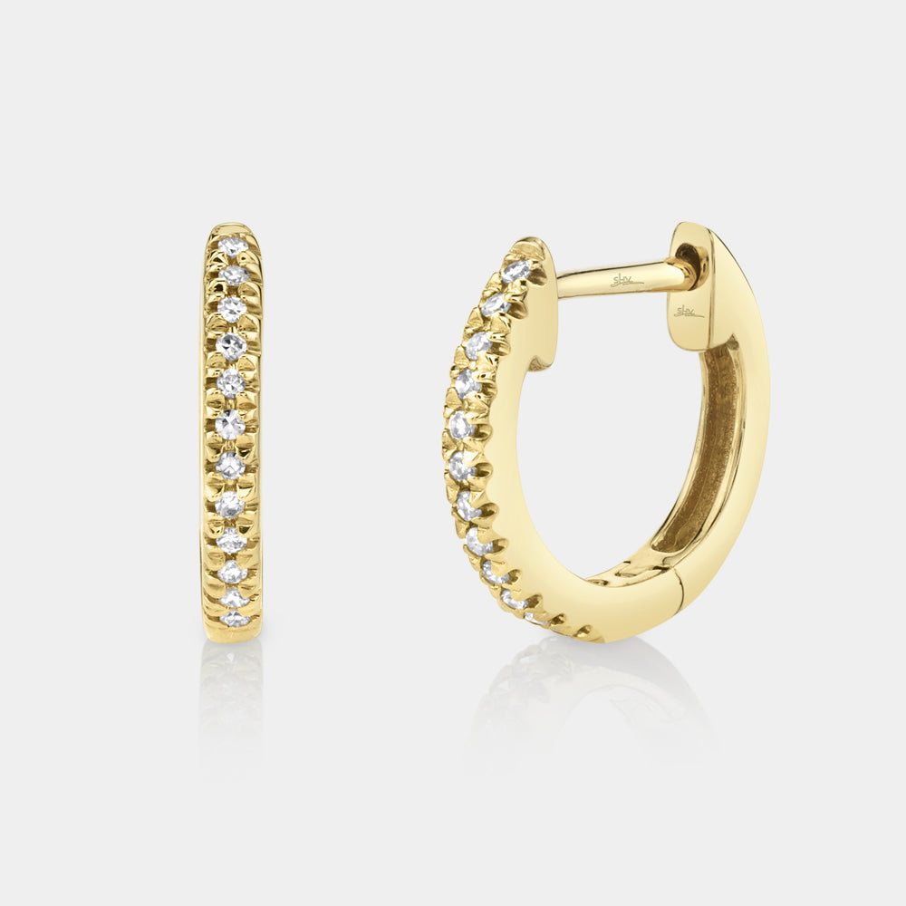 Yellow gold diamond huggie earrings, front view