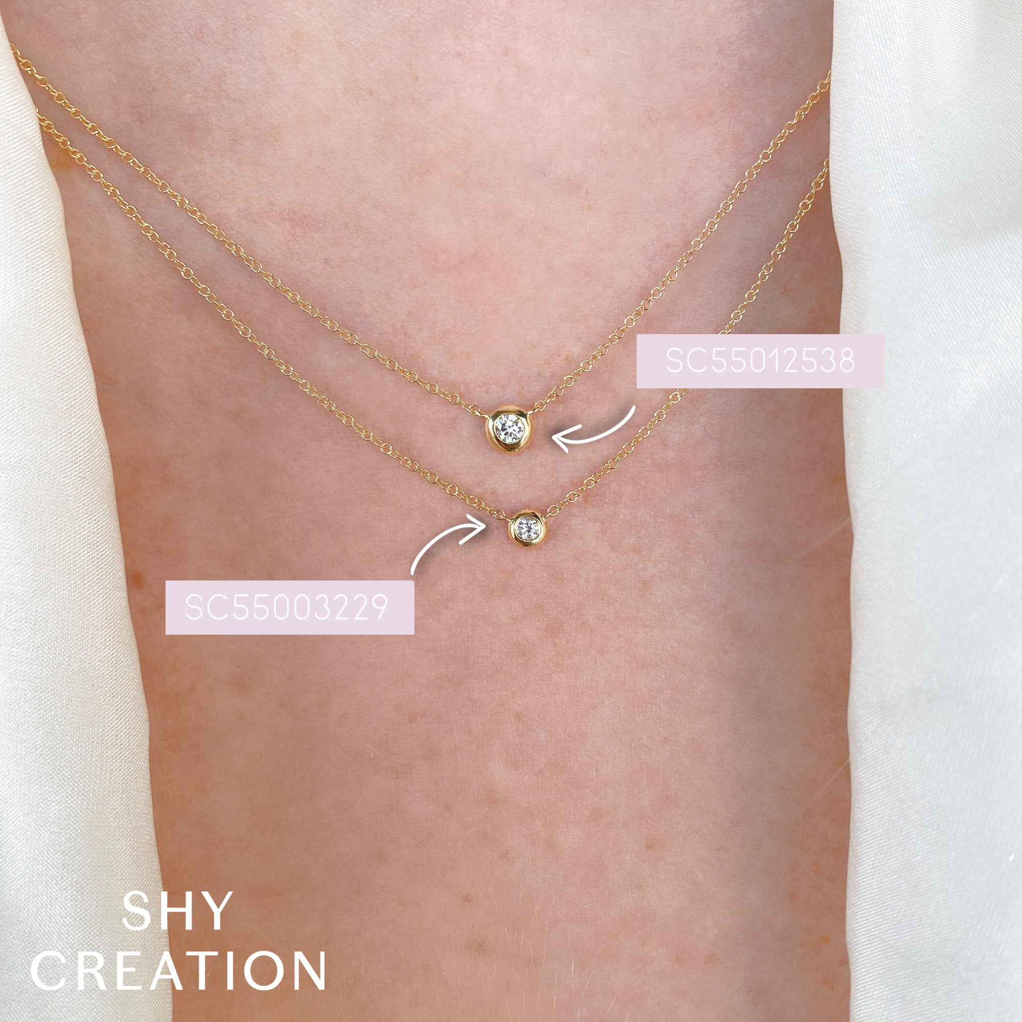Gold necklace with small round diamonds worn on a person's neck, with 'SHY CREATION' branding.