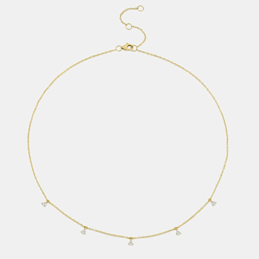 Yellow gold diamond station necklace, front view