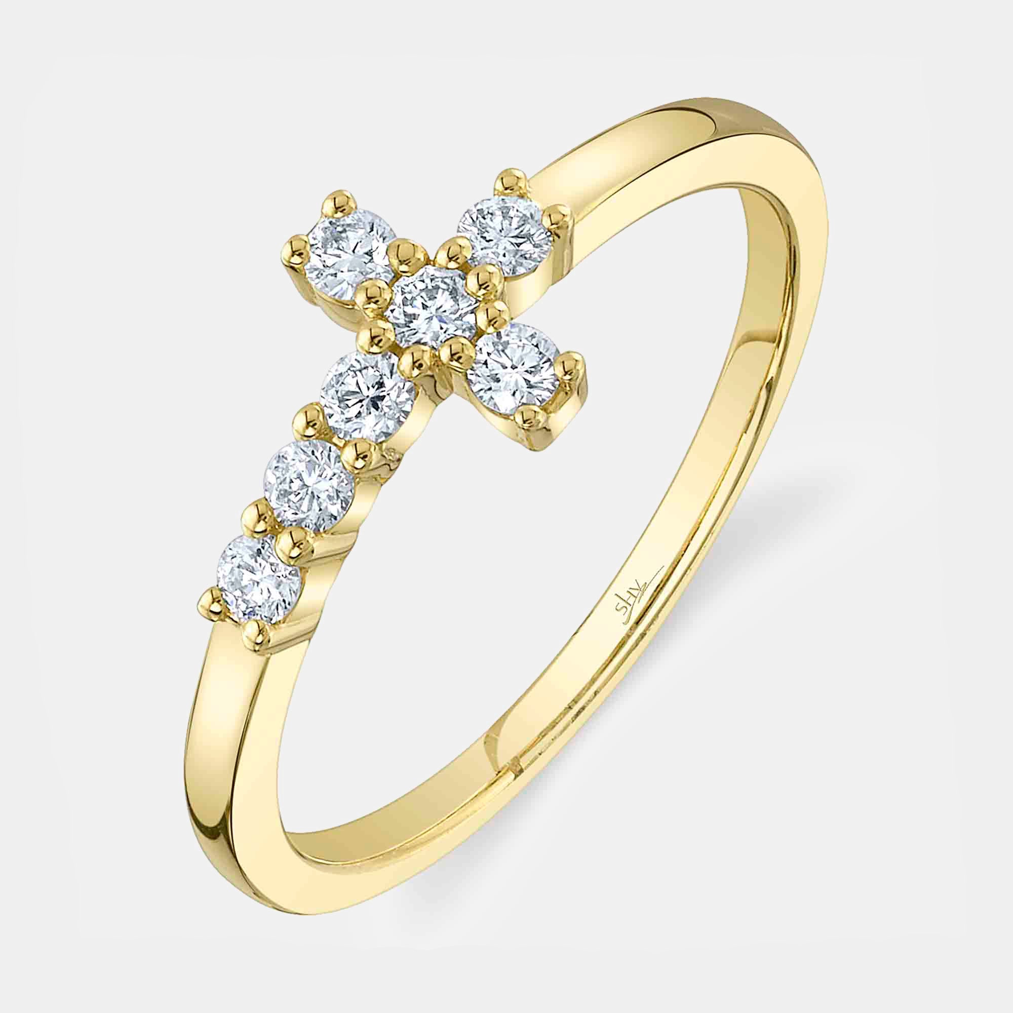 Yellow gold east-west diamond cross ring, side angle view