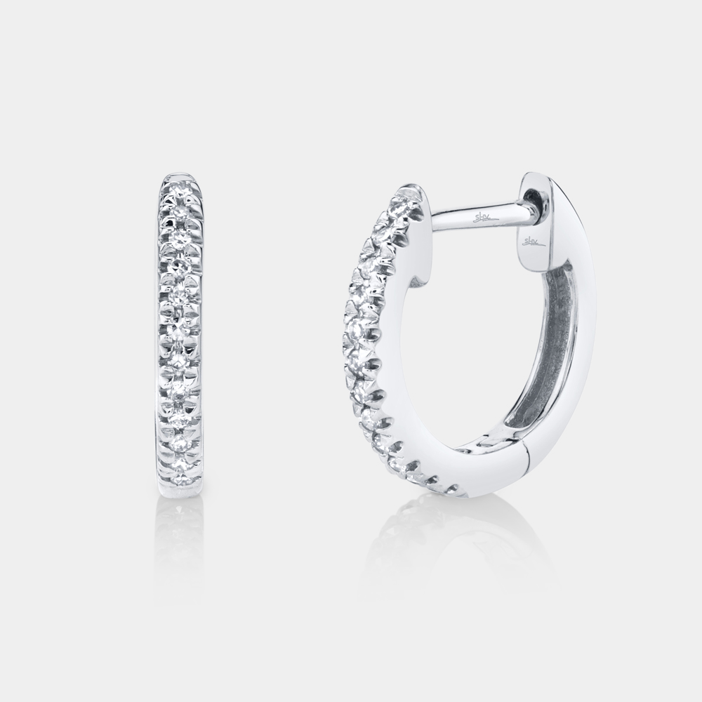 White gold diamond huggie earrings, front view