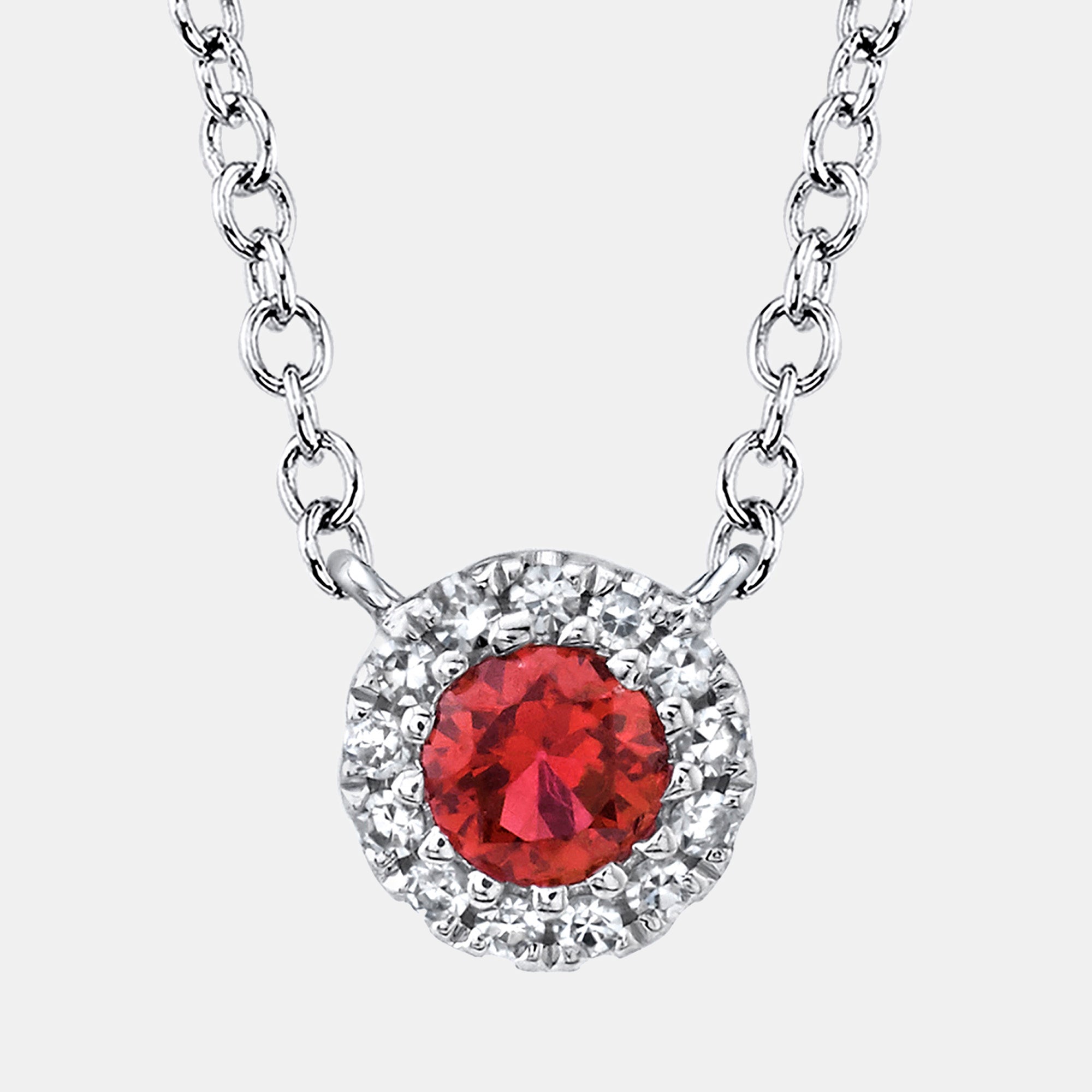 White Gold necklace with a red ruby pendant