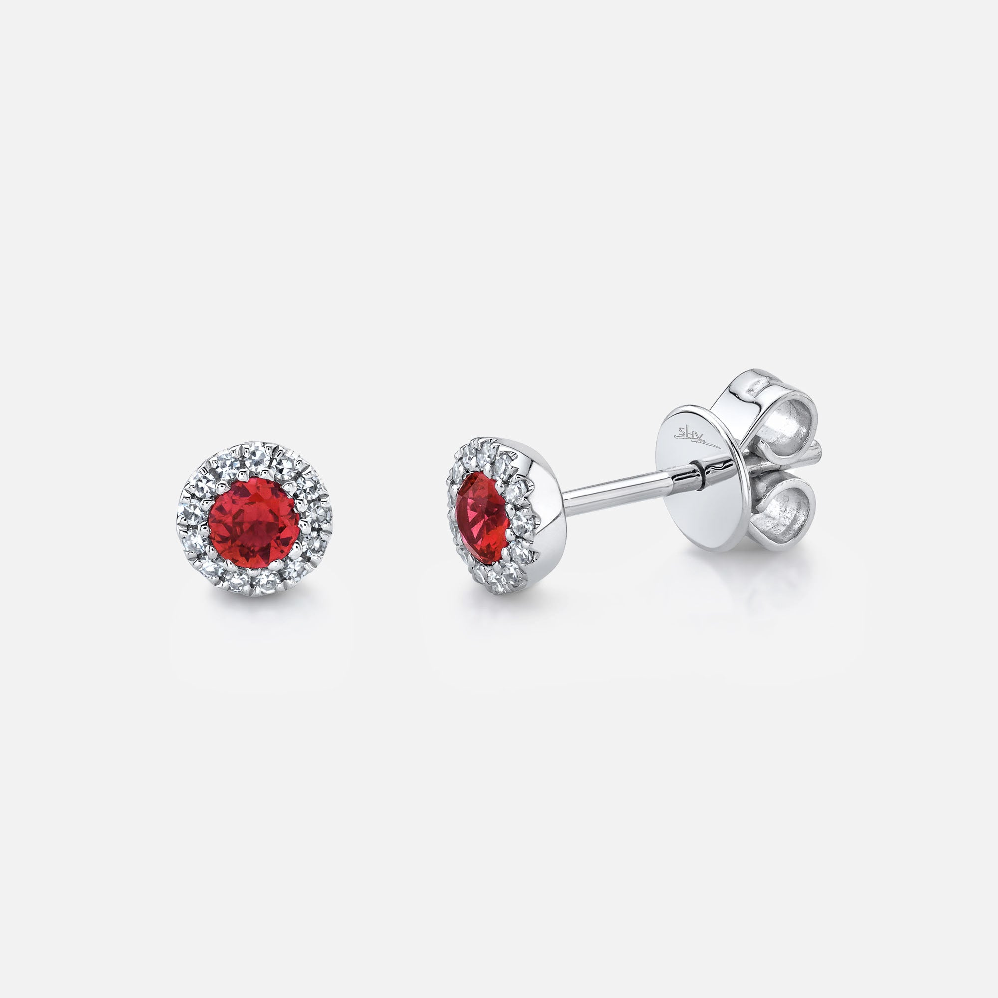 White gold ruby diamond studs, front angle view