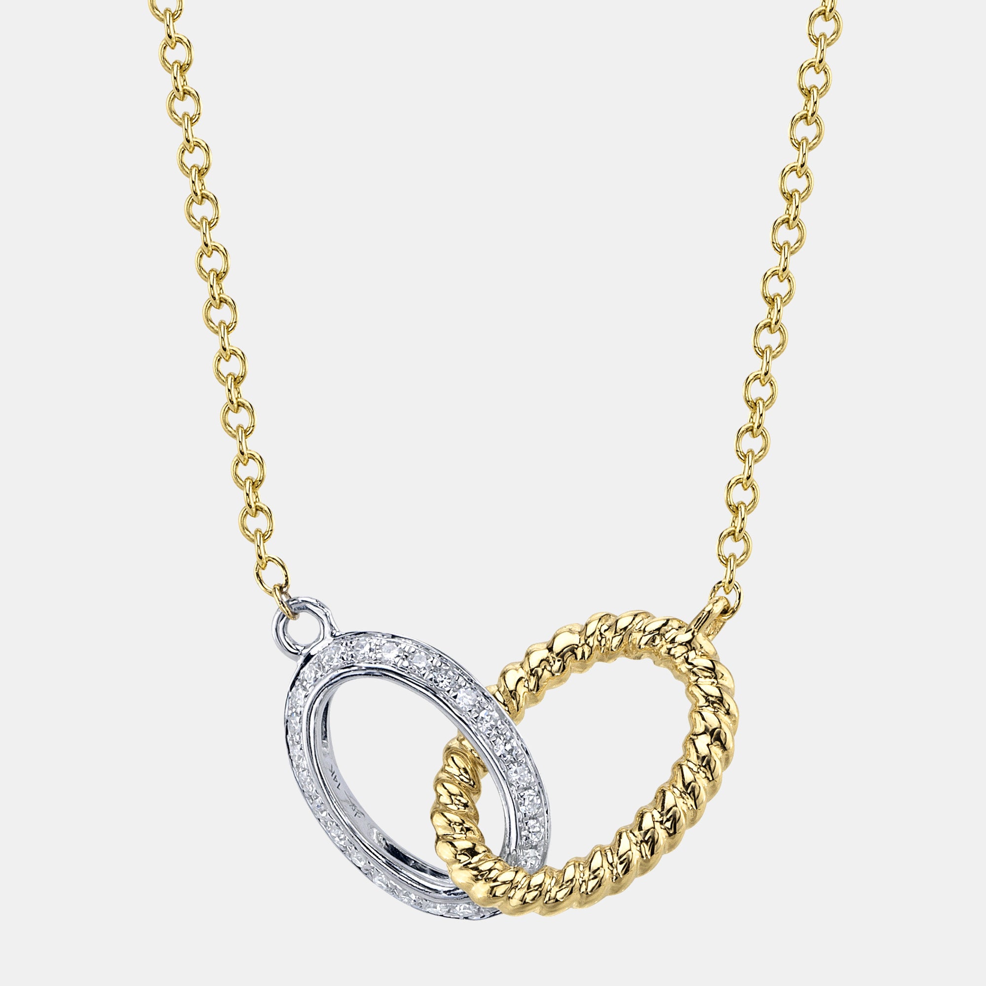 White and yellow gold interlocking circle pendant necklace, front view
