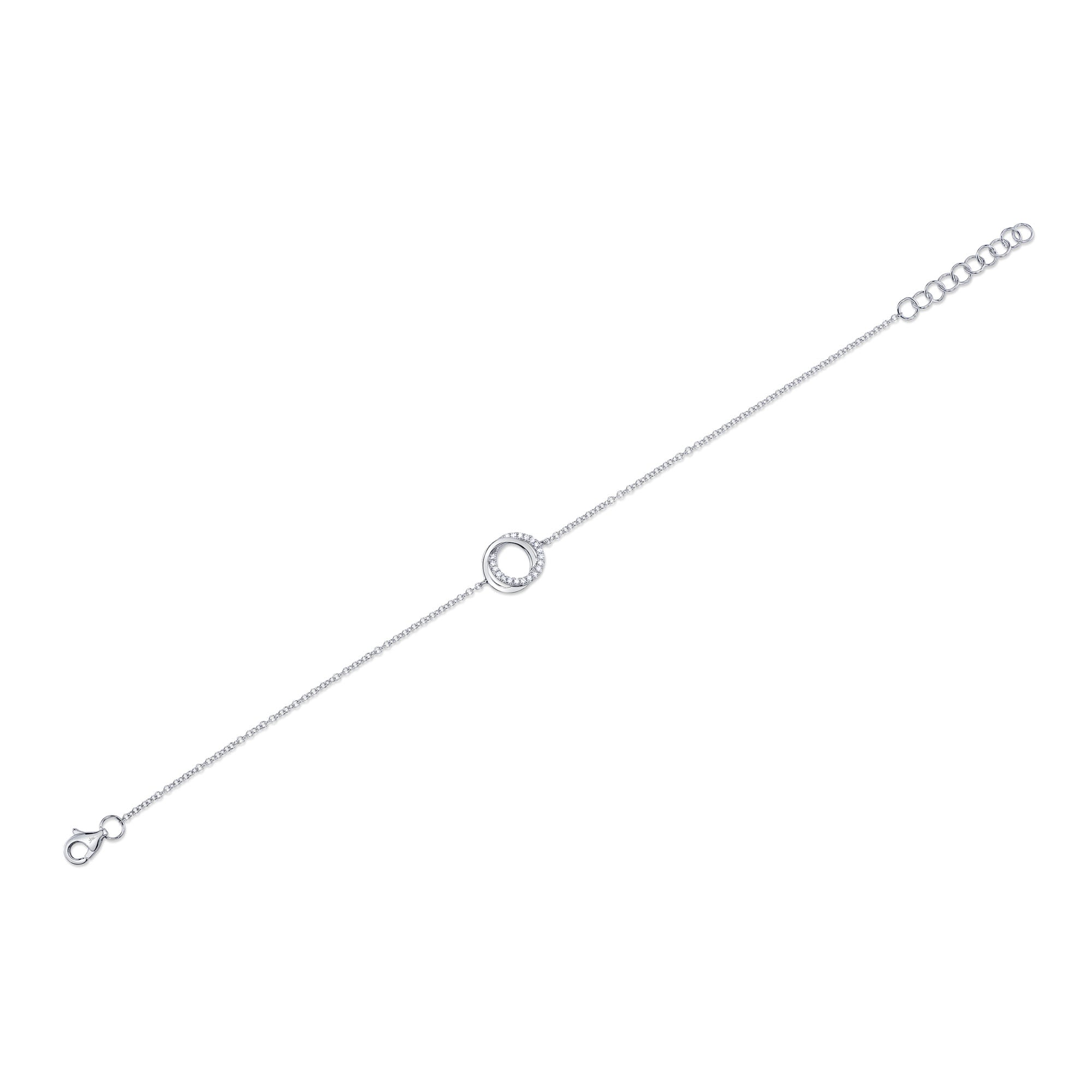 White gold diamond love knot bracelet, flat lay