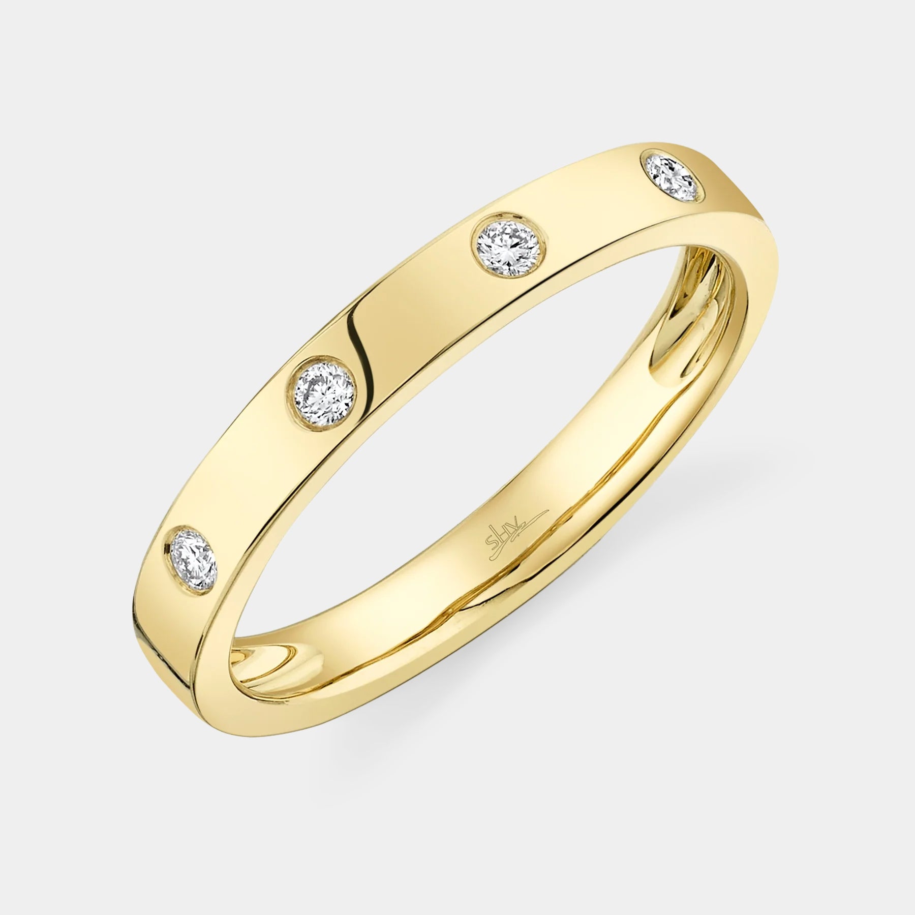 Yellow gold bezel set diamond fashion ring, front angle view