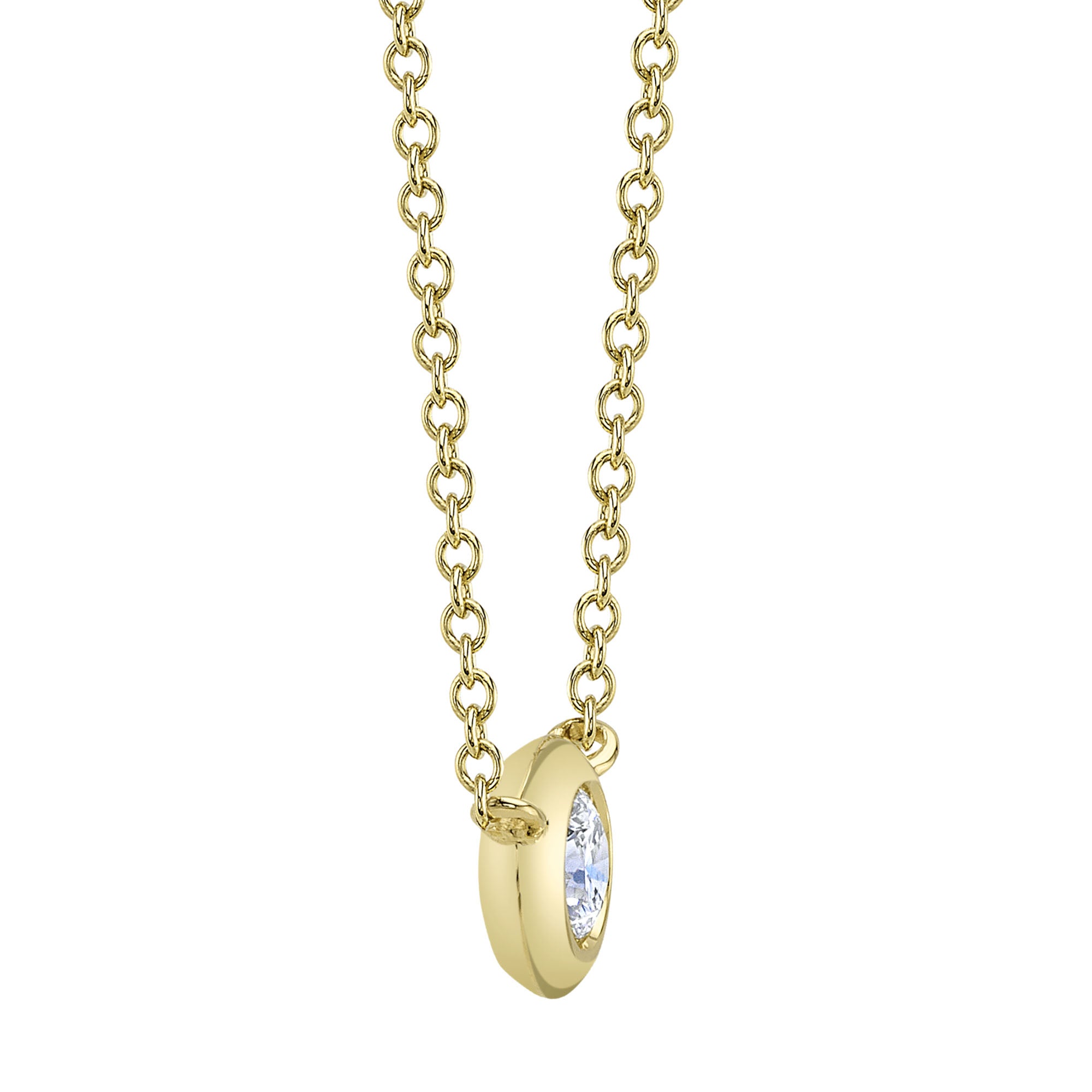 Yellow gold bezel-set diamond pendant necklace, side angle view