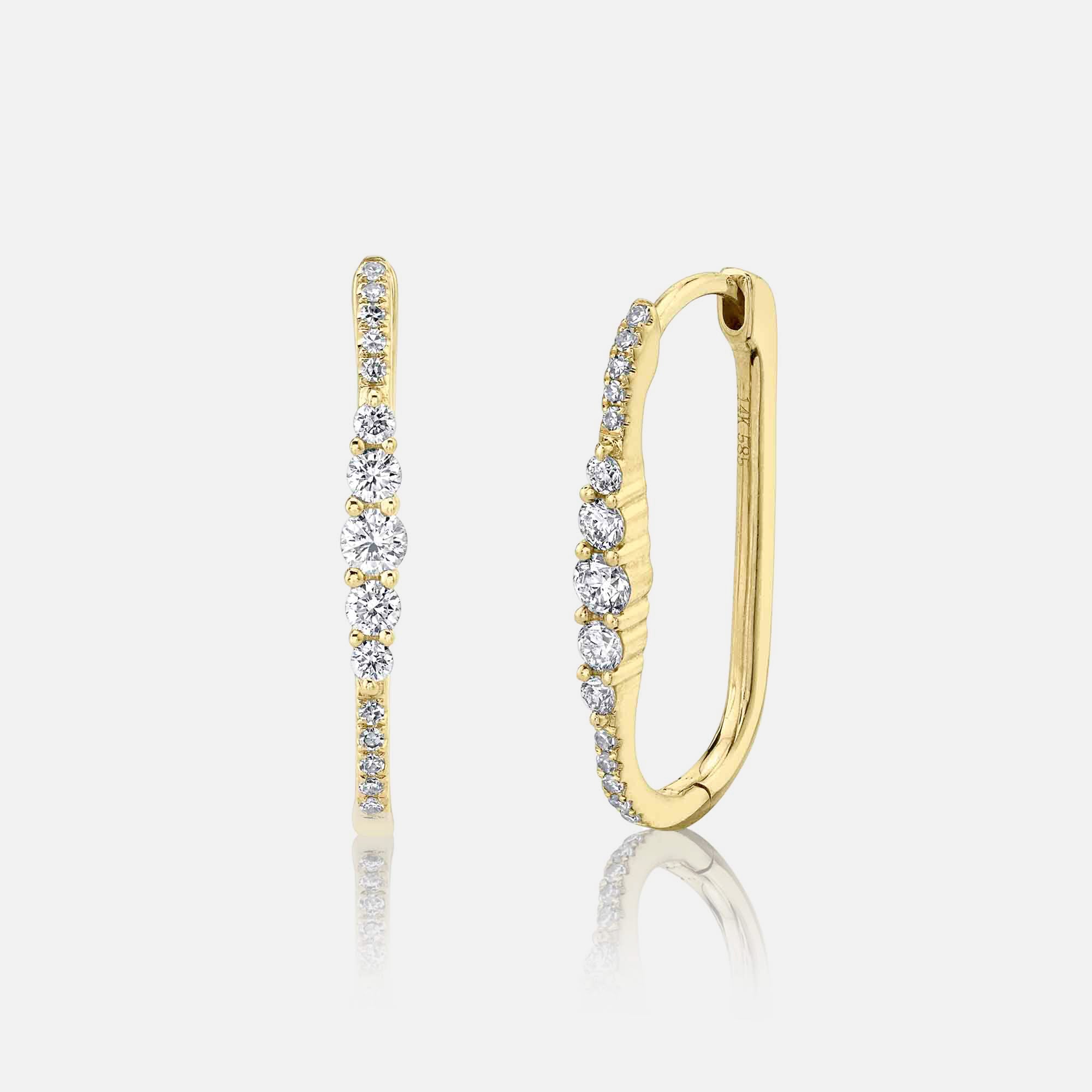 Yellow gold diamond hoop earrings, side angle view