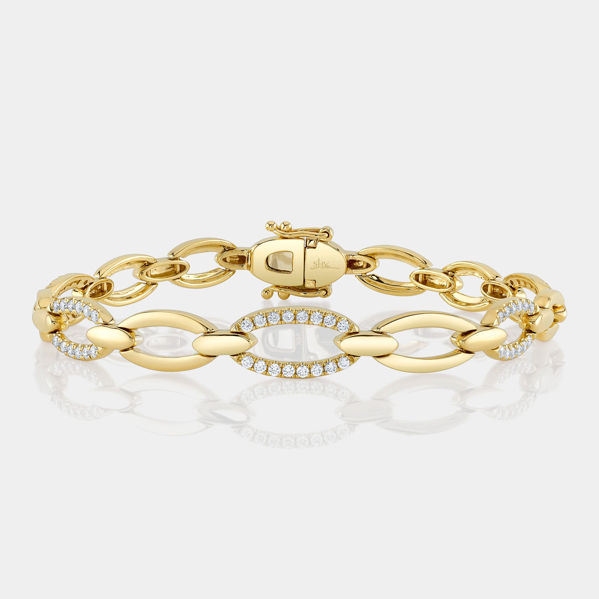 Yellow gold diamond link bracelet, front angle view