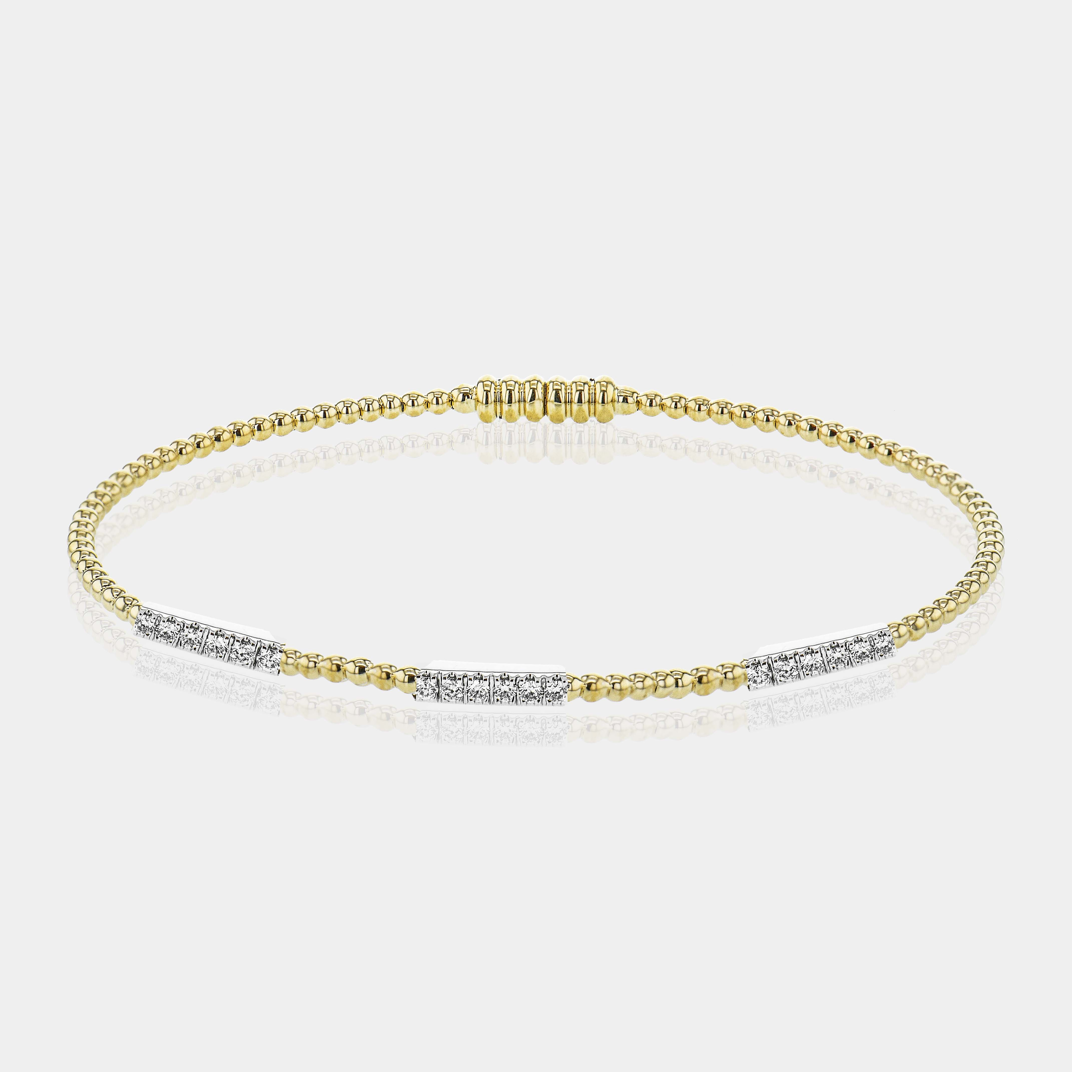 Yellow gold diamond bangle bracelet, flat lay view