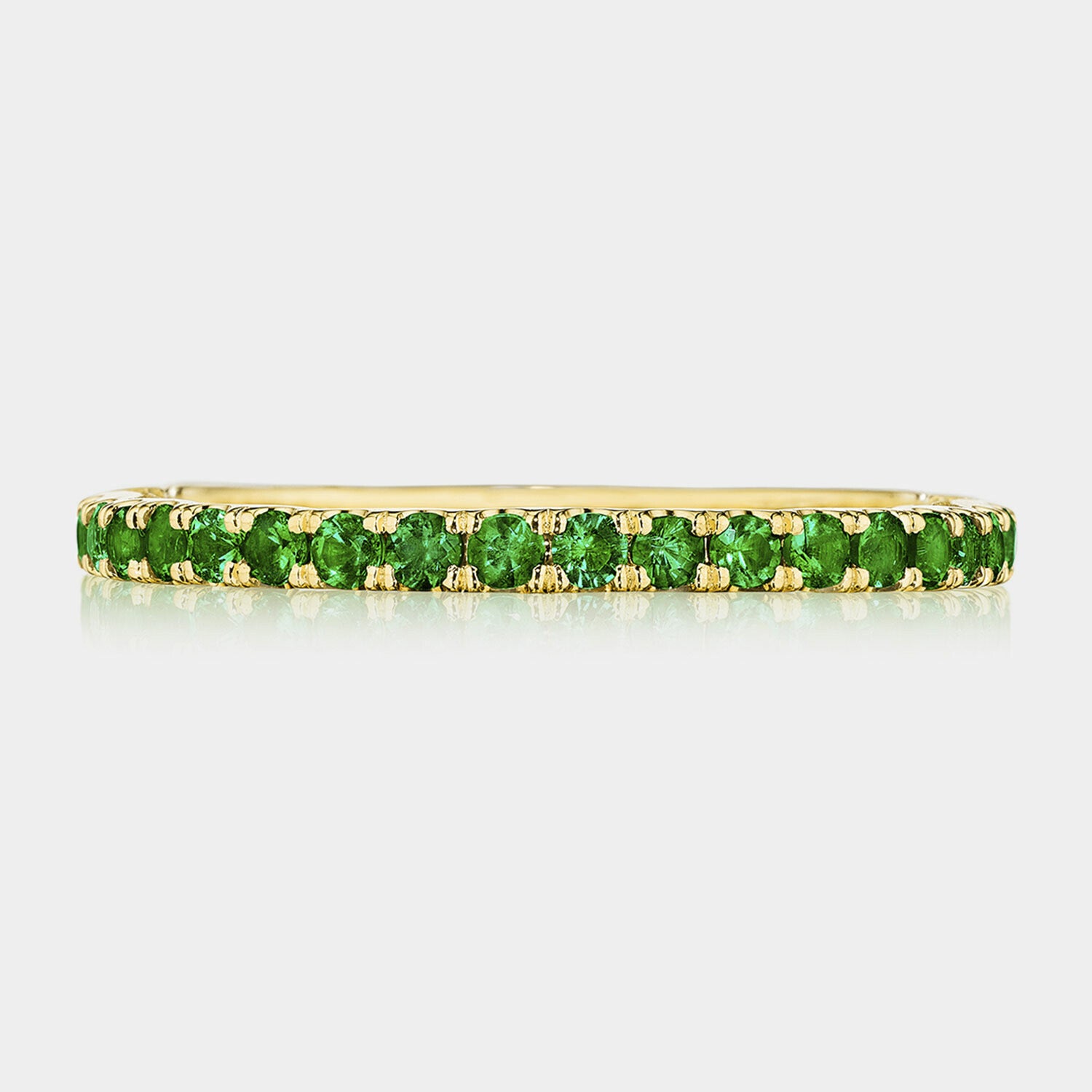 yellow gold emerald eternity band