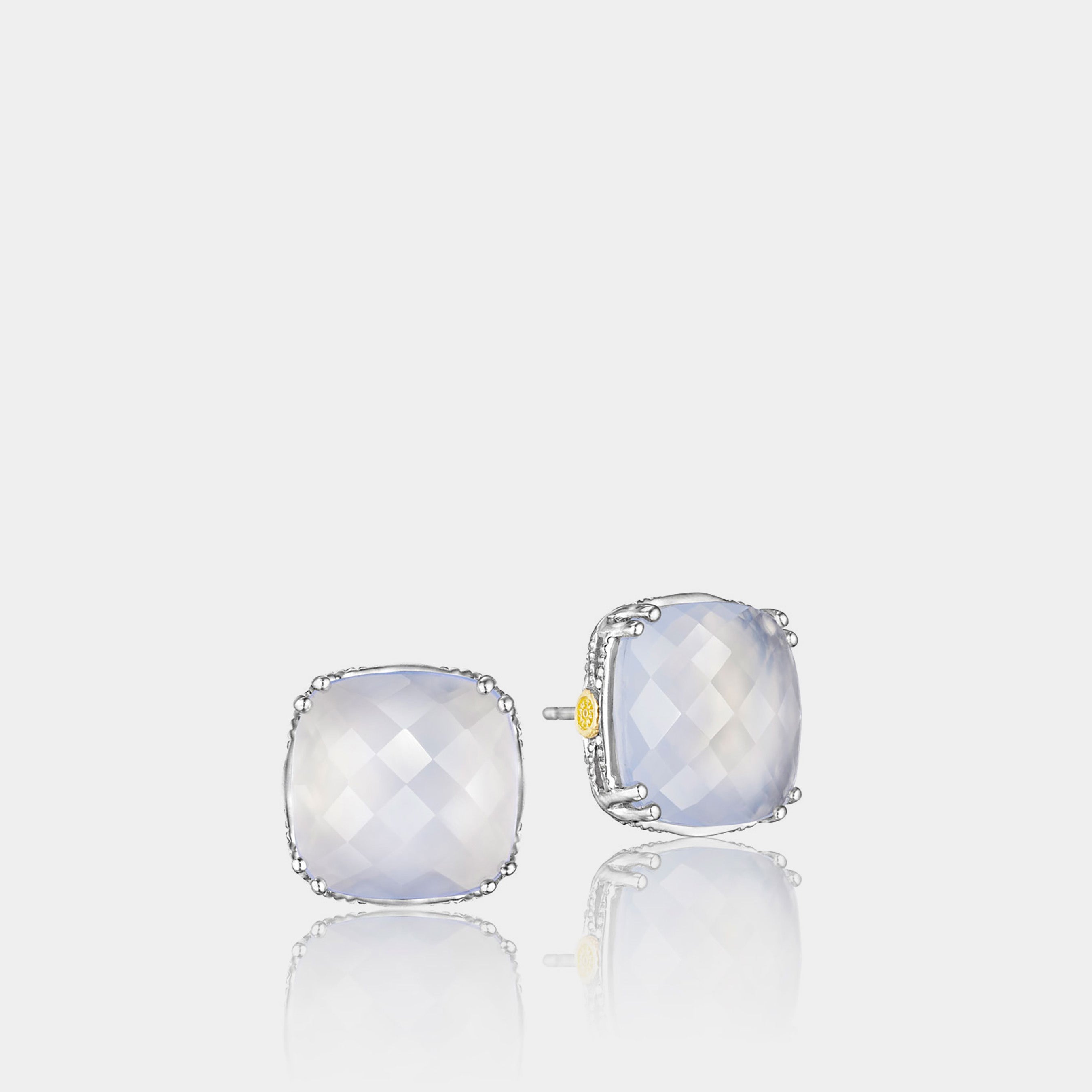 Sterling Silver and Yellow Gold Chalcedony Earrings on grey background.