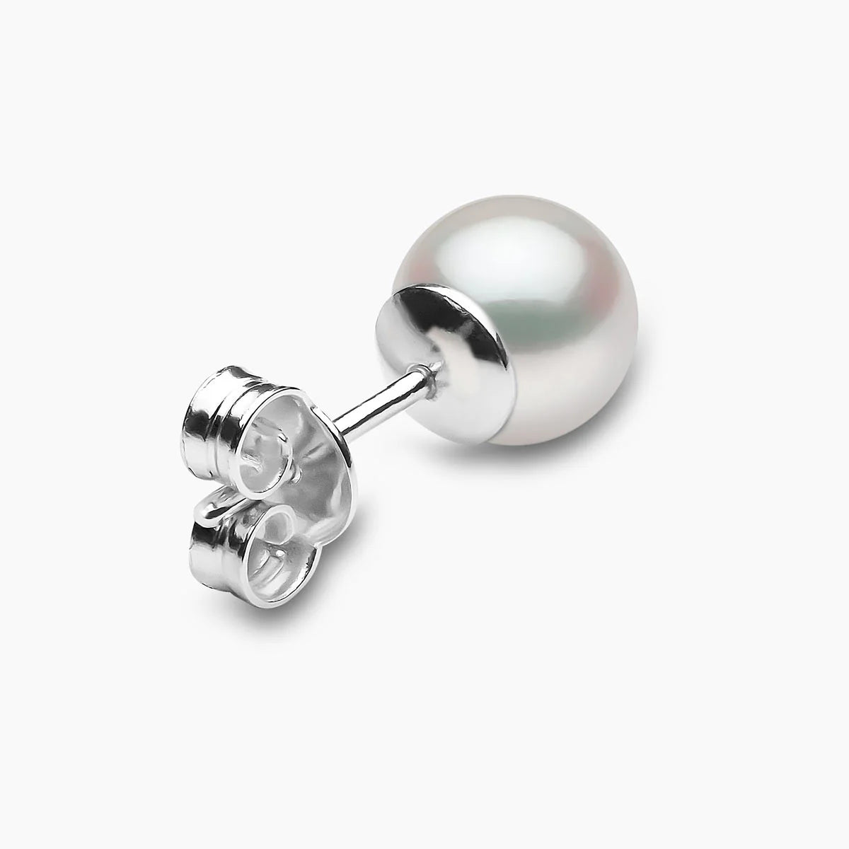 White gold classic pearl earring on grey background, rear view