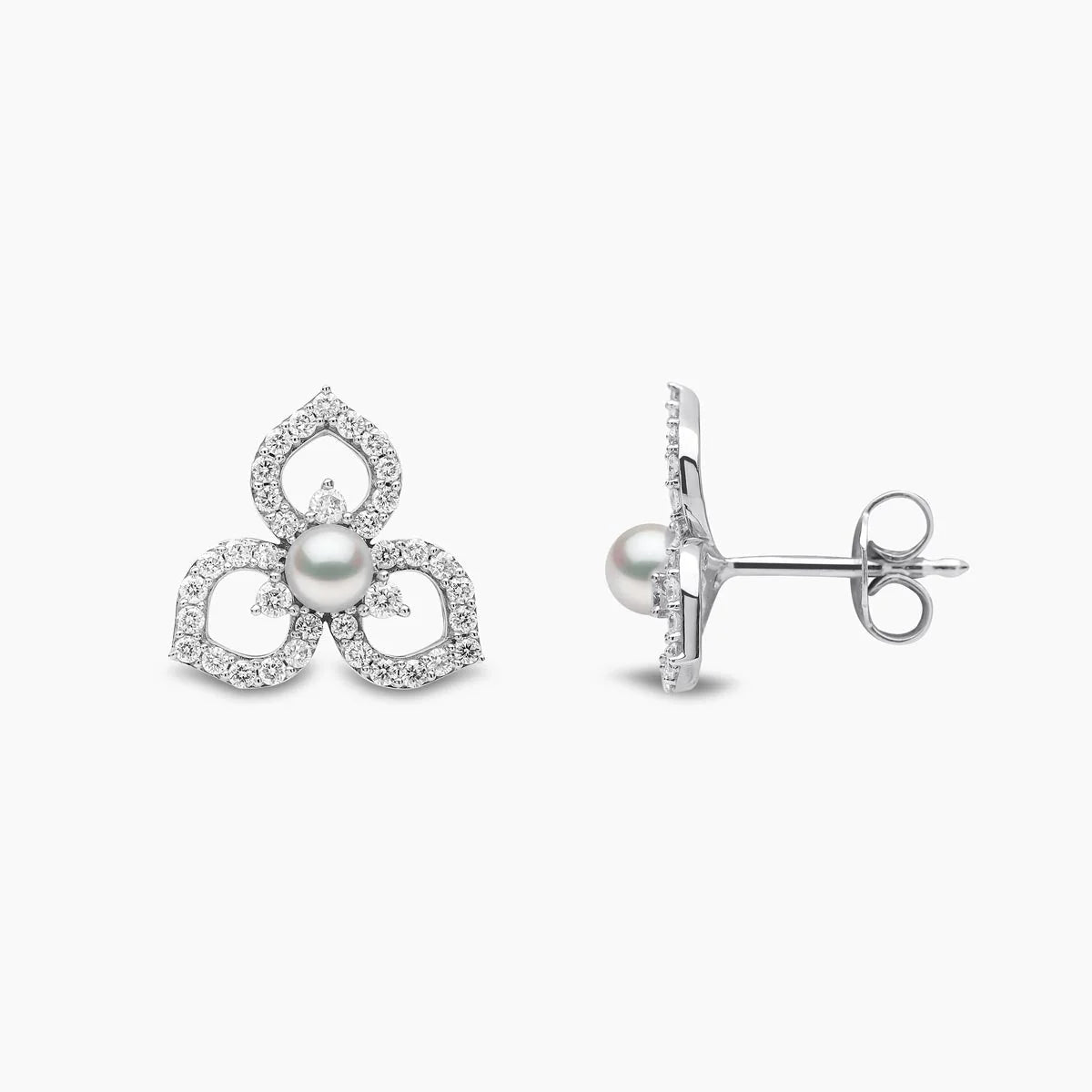 White gold pearl and diamond floral pattern stud earring on grey background, front and side view
